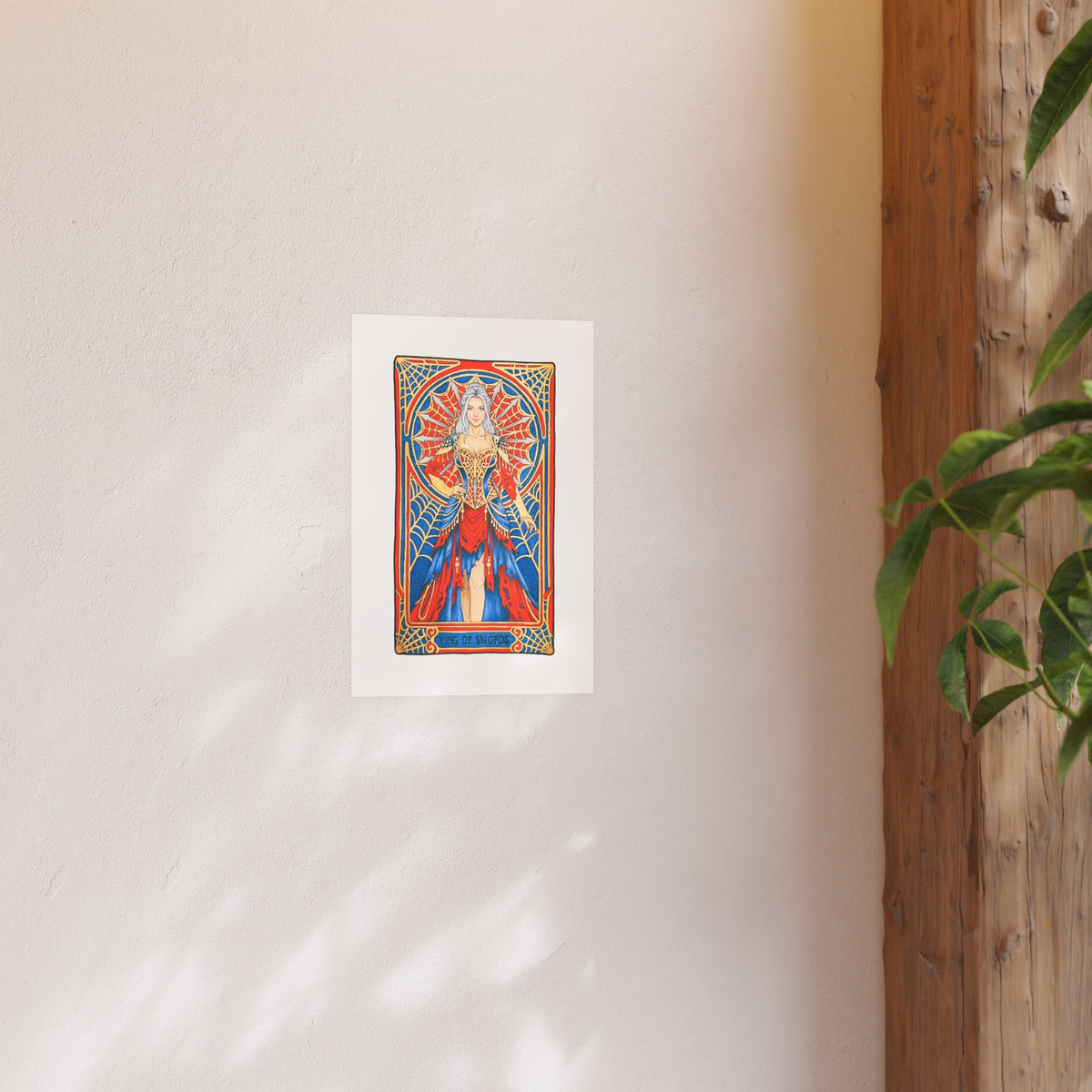 King of Swords tarot poster: silver-haired figure in a red and blue gown with a spiderweb halo