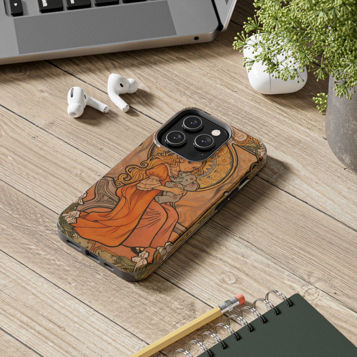 Inner Child tough phone case: girl in an orange dress holding a small gray elephant under a golden halo